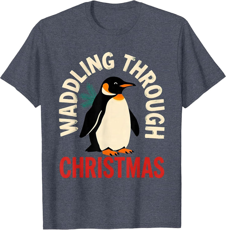 Waddling Through Christmas Funny Penguin Lover Christmas T-Shirt - Heather Blue